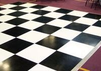 Indoor/Outdoor Dance Floor-Black White (per sq foot) Requires a solid flat surface (no grass or gravel). Click for sizes & set up details